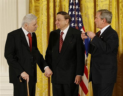 The Sherman Brothers receive the National Medal of Arts at The White House on November 17, 2008, (left to right:  Robert B. Sherman, Richard M. Sherman and U.S. President George W. Bush)[27]