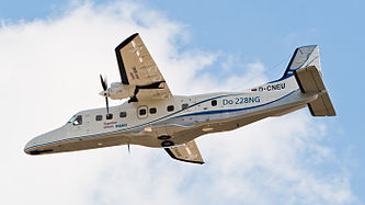 English: Dornier Do 228 NG (D-CNEU), produced by RUAG Aviation, flying a display at ILA Berlin Air Show 2012. Deutsch: Dornier Do 228 NG (D-CNEU), herstestellt von RUAG Aviation, während der Flugvorführung auf der ILA Berlin Air Show 2012.