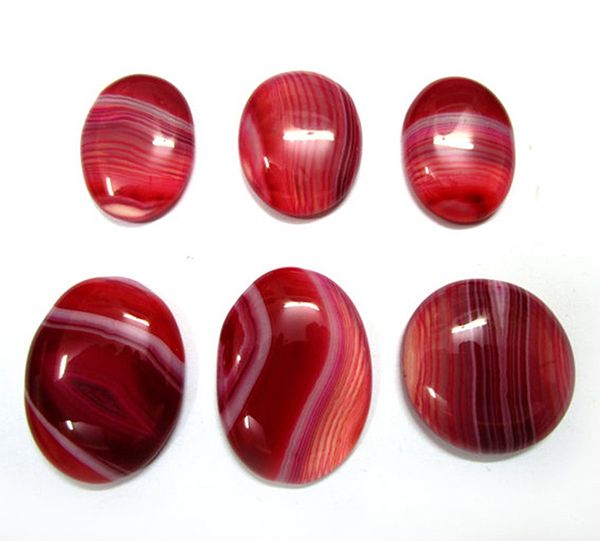 Cabochons of red onyx, also called sardonyx