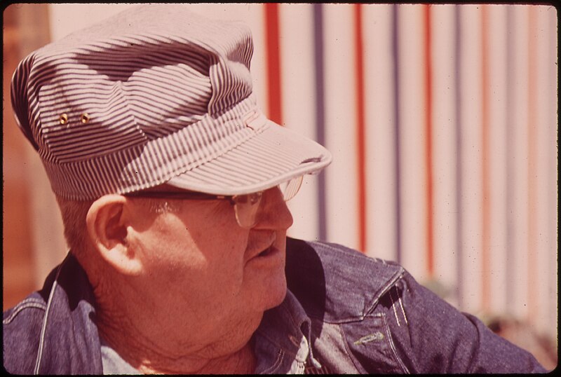 File:Resting on a bench on Diller's Main Street, an elderly citizen surveys the passing scene. Near Lincoln, NB. May, 1973 - NARA - 547338.jpg