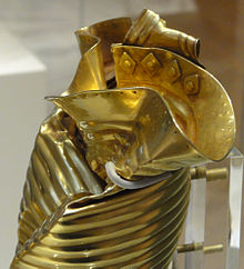 Side view showing rivets and pointille lip decoration. Ringlemere Cup detail.jpg