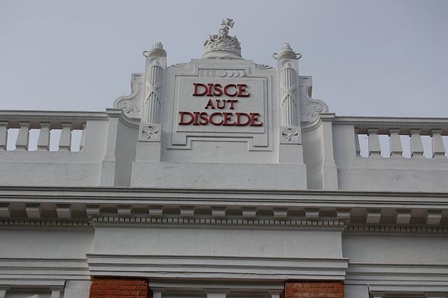 Royal College motto on top of the Main building