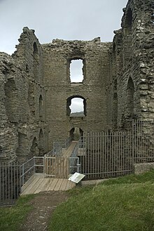 The ruined great keep of Clun Castle, designed for the Fitz Alan family's residential use. Ruins of Clun Castle.jpg