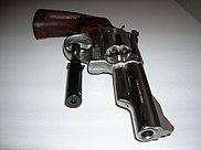 Smith & Wesson revolver equipped with a laser sight mounted on the trigger guard. S&W .357 Magnum With Laser Sight.jpg