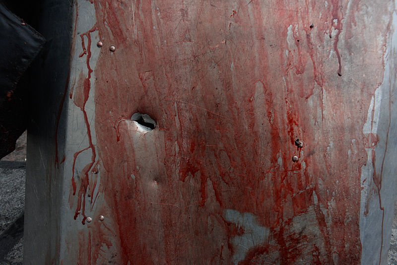 File:Schield covered with blood with a bullthole in it. Clashes in Kyiv, Ukraine. February 20, 2014.jpg
