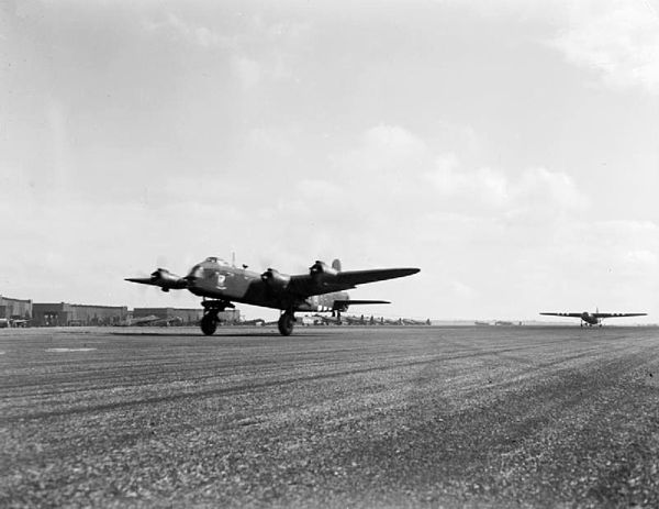 A Short Stirling bomber taking off from RAF Harwell, Oxfordshire with a Horsa glider in tow for Operation Market Garden, 17 September 1944