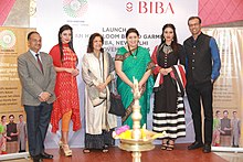 Meena Bindra (third from left) with Union Minister of Textiles Smriti Irani (fourth from left) at the launch of collaboration between India Handloom Brand and BIBA Apparels Smriti Irani at the launch of collaboration between India Handloom Brand and BIBA Apparels Private Limited, for promotion of India Handloom Brand garments at BIBA stores, at the BIBA store at Lajpat Nagar, in New Delhi (1).jpg