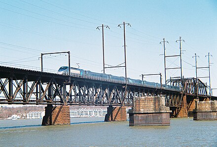 Amtrak Acela Express crosses the Susquehanna River in Maryland on a bridge built by the PRR in 1906.