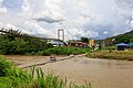 * Nomination Swinging Bridge and old Land Bridge over the Sungai Tamparuli in Tamparuli, Sabah --Cccefalon 07:30, 29 June 2014 (UTC) * Promotion Greens of the folliages seem somewhat smoothed (by NR?) in some places; however this rather impressive scene is a QI for me. --Myrabella 12:15, 6 July 2014 (UTC)