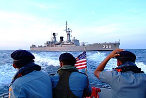 US Navy 050728-N-4772B-428 Indonesian Navy boarding team members ride one of the amphibious dock landing ship USS Harpers Ferry's (LSD 49) small boats from the Indonesian frigate Karel Satsuit Tubun (KST 356) to the guided miss.jpg