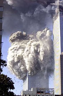 View from the northeast of the collapsing South Tower. WTC 2 going down.jpg