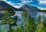 Overlooking a lake from an elevated grassy perch.