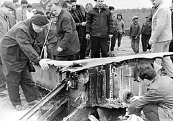 Soviet specialists inspect the wreckage of the B-52 Stratofortress which was shot down near Hanoi on 23 December 1972. SVS u oblomkov sbitogo B-52 v okrestnostiakh Khanoia 23.12.1972 (1).jpg