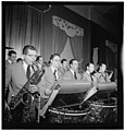 (Portrait of (Robert) Dean Kincaide, Bill Ainsworth, Ray Beller, Peanuts Hucko, Pete Terry, Vernon Friley, Irv Dinkin, and Jim Harwood, Hotel Commodore, Century Room, New York, N.Y., ca. Jan. 1947) (LOC) (5395851592).jpg