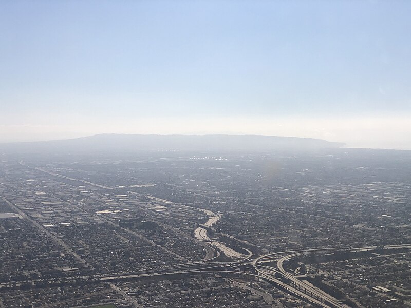 File:2021-10-05 14 21 58 View southwest across southern Los Angeles, California towards the interchange of Interstate 105 and Interstate 110 from an airplane heading toward Los Angeles International Airport.jpg
