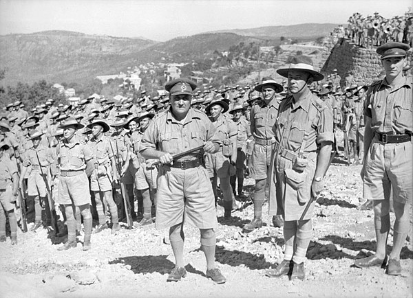 Hammana, Lebanon. 2 September 1941. Maj. Gen. A. S. "Tubby" Allen (centre), commander of the 7th Division, with Lt Col. Murray Moten (centre right), c