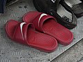 A Red Nike Slippers on the tattoo shop at Cheung Chau.jpg