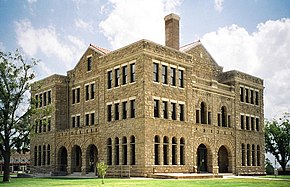 Здание окружного суда в Арчер-Сити. В 1977 году здание построенное в романском стиле было включено в Национальный реестр исторических мест США.