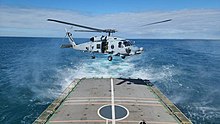 Australian Navy helicopter of HMAS Anzac approaching INS Sumedha's flight deck during a Maritime Partnership Exercise 2022 Australian Navy helicopter of HMAS Anzac approaching INS Sumedha's flight deck during a maritime partnership exercise.jpg