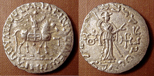 Silver coin of Vijayamitra in the name of Azes. Buddhist triratna symbol in the left field on the reverse.