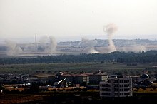 Ras al-Ayn shelling during the 2019 Turkish offensive into north-eastern Syria. Baris Pinari Harekati sonrasi Resulayn (Serekani) bombalaniyor.jpg