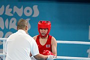 Deutsch: Boxen bei den Olympischen Jugendspielen 2018 Tag 12, 18. Oktober 2018 - Finale Leichtgewicht Mädchen – Junioren-Weltmeisterin und dreifache Juniorinnen-Europameisterin Caroline Sara DuBois (Großbritannien, blau) schlägt Juniorinnen-Asienmeisterin Porntip Buapa (Thailand, rot). English: Boxing at the 2018 Summer Youth Olympics on 18 October 2018 – Girls' lightweight Gold Medal Bout – Caroline Sara DuBois (Grat Britain, blue) wins over Porntip Buapa (Thailand, red). Español: Boxeo en los Juegos Olímpicos Juveniles de Verano de 2018 en 18 de octubre de 2018 - Combate de medalla de oro de peso ligero para niñas - Caroline Sara DuBois (Gran Bretaña, azul ) gana sobre Porntip Buapa (Tailandia, rojo).