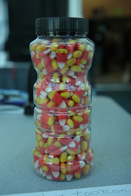The exact number of candies in this jar cannot be determined by looking at it, because most of the candies are not visible. The amount can be estimated by presuming that the portion of the jar that cannot be seen contains an amount equivalent to the amount contained in the same volume for the portion that can be seen.