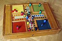 Parcheesi is an American adaptation of a Pachisi, originating in India. Clann.jpg