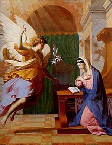 The Annunciation by Eustache Le Sueur, an example of 17th century Marian art. The Angel Gabriel announces to Mary her pregnancy with Jesus and offers her White Lilies.