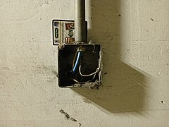 Exposed and abandoned electrical wiring in the old garage 2.jpg