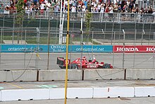 Franchitti celebrating his victory in the 2009 Honda Indy Toronto Franchittivictorylaptoronto.jpg