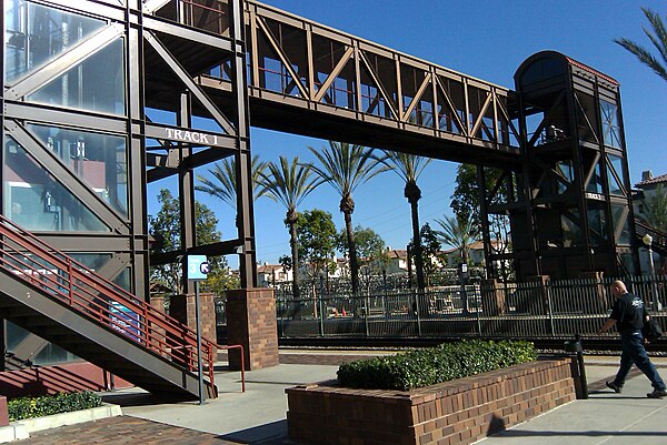 Pedestrian bridge and tracks at the Fullerton station