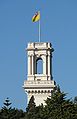 The belvedere tower of Government House with the flag of the Governor of Victoria raised