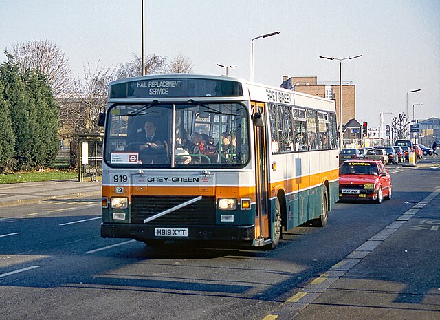 Grey-Green East Lancs EL2000 bodied Volvo B10B in Enfield in January 1997