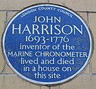 Blue plaque commemorating Harrison in Red Lion Square in London
