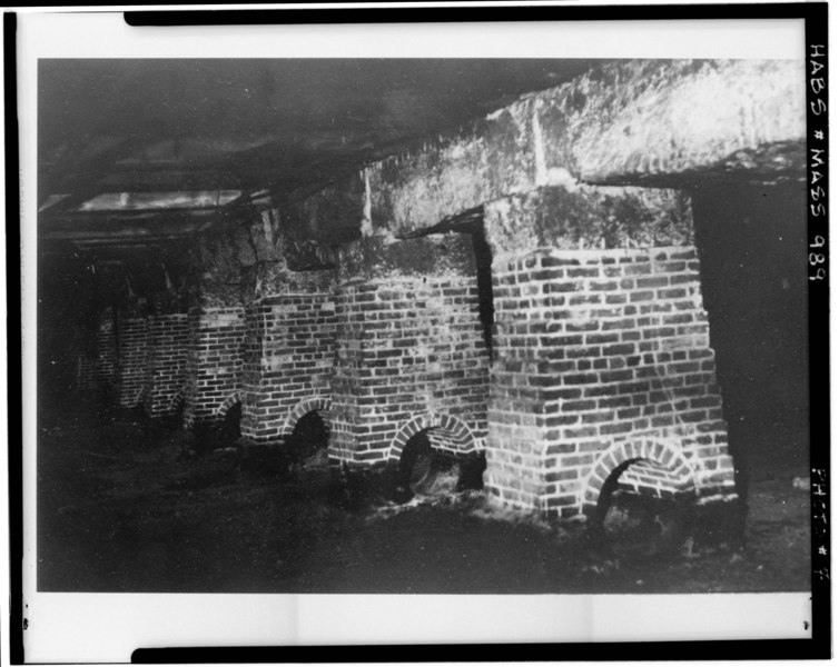 File:Historic American Buildings Survey Robert M. Vogel, Photographer August, 1967 INTERIOR BASEMENT, CENTER MASONRY PIERS, WITH OPENINGS FOR FORMER MAIN DRIVE SHAFT - Pemberton Mill, HABS MASS,5-LAWR,2-5.tif