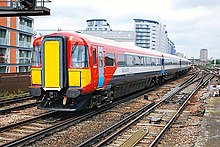 A British Rail Class 442 third-rail electric multiple unit in Battersea. Hugh llewelyn 442 442 (6620468847).jpg