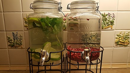 Left side: Lime, ginger and mint infused water  Right side: Pomegranate infused water