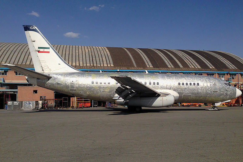File:Iranian Govt Boeing 737-200 stripped for a D-check.jpg