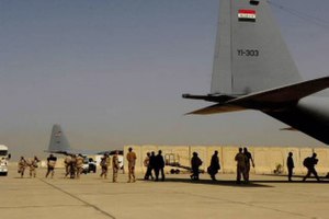 Members of the Iraqi Army board an Iraqi C-130 Hercules for a flight to Basra, Iraq at New Al Muthana Air Base in Baghdad on 30 Mar. Iraqi army flight basra.jpg