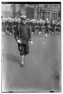 Sousa marching along with his band in 1918