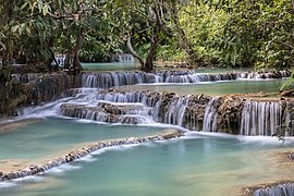 Kuang Si Falls and its emerald water pools in Luang Prabang province Laos