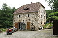 Brick mill: Mill property with residential mill house and outbuildings, earth cellar, water basin, fountain ring, washing area with stairs, pigeon house, large granite water trough, footbridge and other parts, some of which have been collected, plus the oak trees lining the path (garden monument)