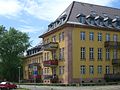 Barracks building (Windscheidstraße 48) in open development and in a corner location, with a side wing (Selneckerstraße 28), as well as front garden and driveway