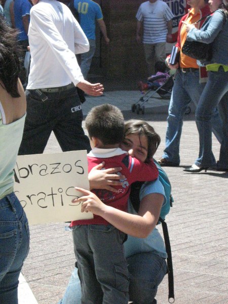 File:Little 'FREE HUGS', Chile.jpg