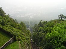 A foggy day on the railway. Chattanooga is barely visible in the background. Lookout Mountain Incline Railway 2007.jpg