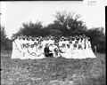 Man and child with group of women at Western College on Tree Day 1903 (3191910807).jpg
