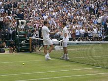 Andy Murray shakes hands with Milos Raonic at the completion of the men's singles final. Murray-Wimbledon2016.jpg