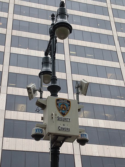 Wireless security cameras on a lamp post deployed by New York City Police Department. They are connected to the municipal NYC Wireless Network (NYCWiN).
