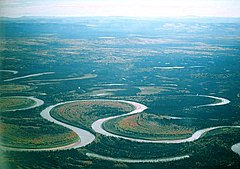 Image 28The Nowitna River in Alaska. Two oxbow lakes – a short one at the bottom of the picture and a longer, more curved one at the middle-right. (from Lake)